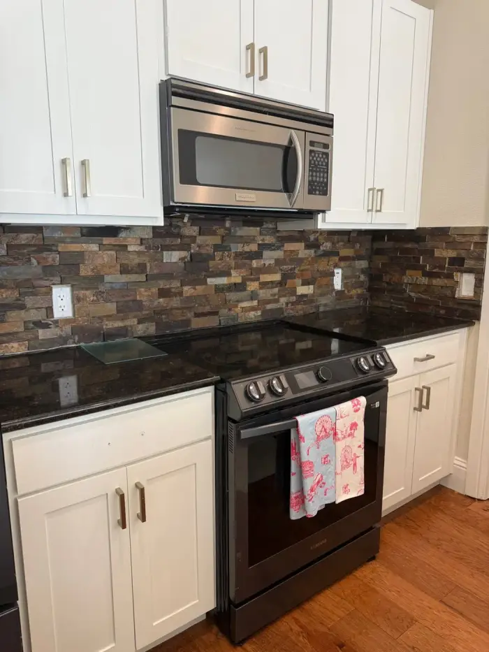 Kitchen with Stone Backsplash &mdash; RGS General Contracting